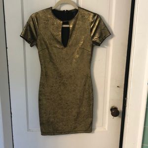 Gold on black mini form fitting dress